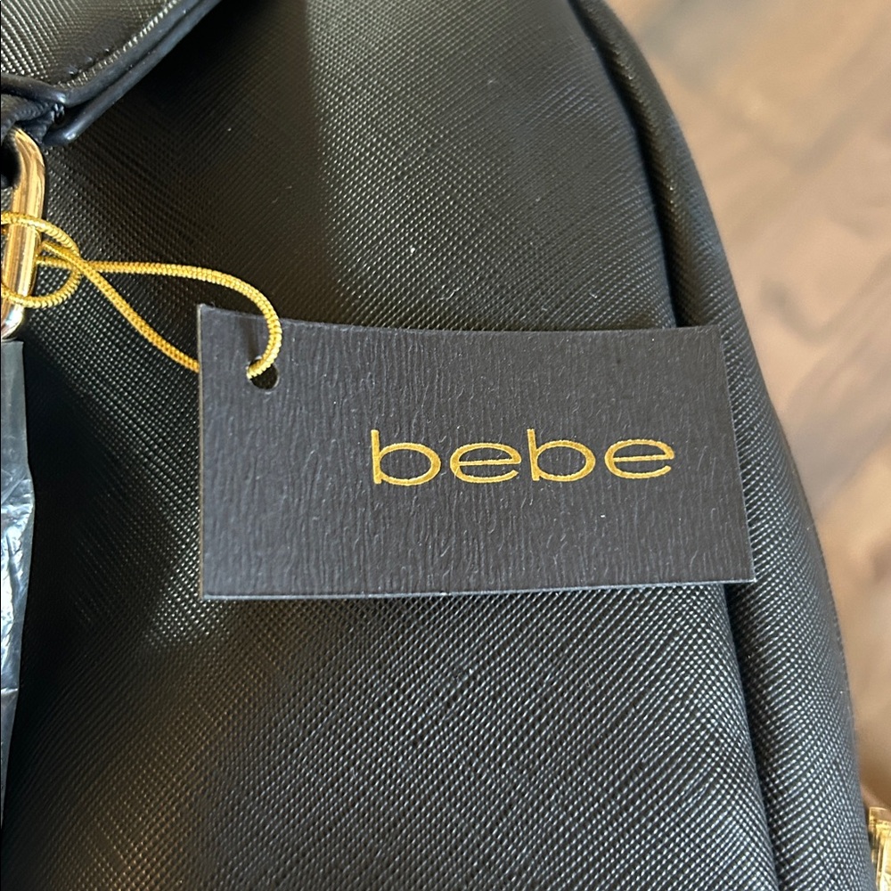 NWT! Bebe Yolanda Sling Backpack in Black with Gold Hardware - Picture 13 of 13